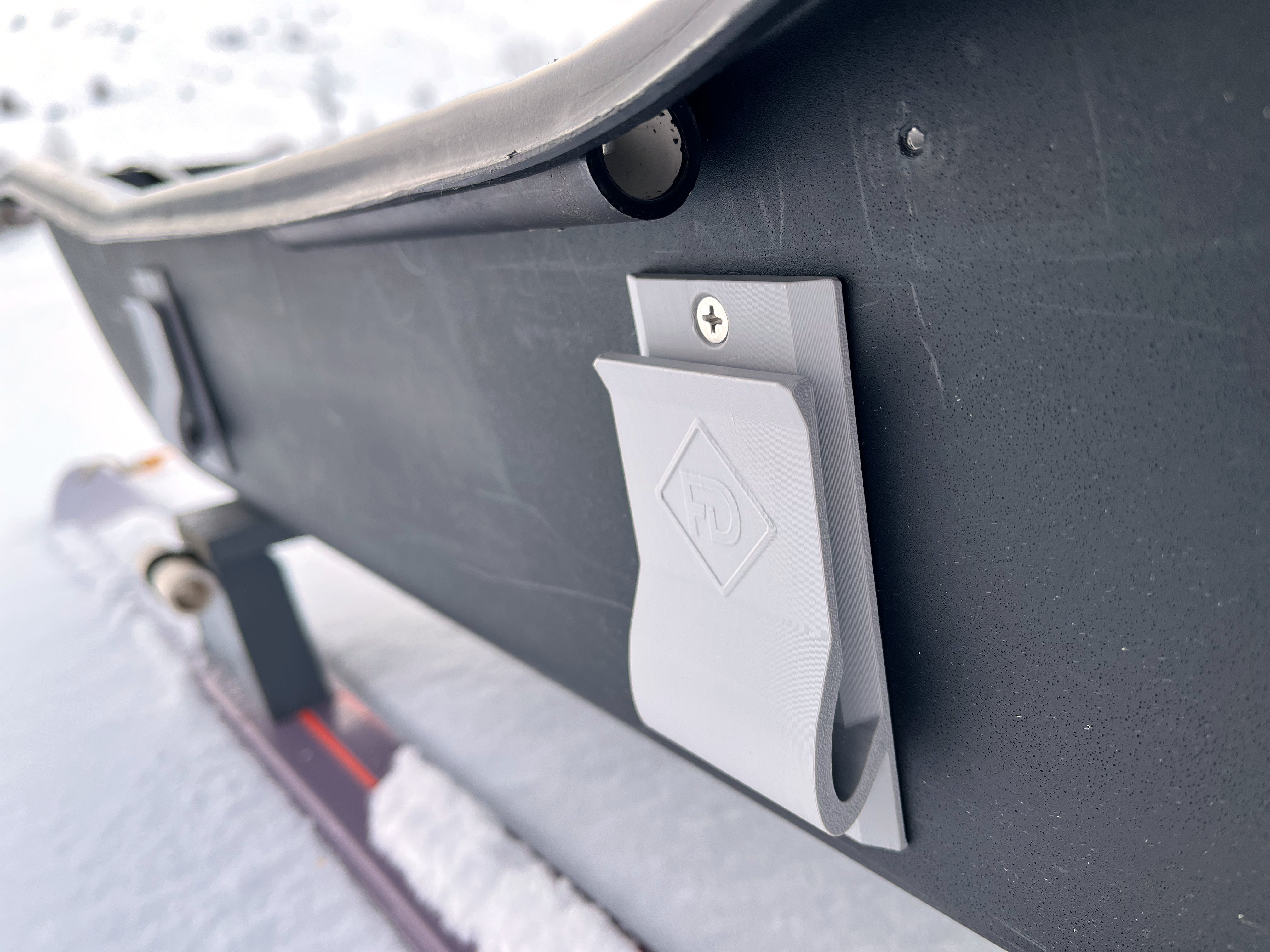 Bump Board Holder, on ice fishing sled close up